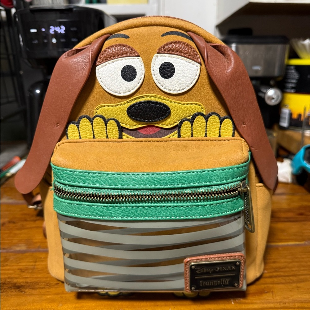 Loungefly Disney Pixar Dog Backpack in Brown and Green